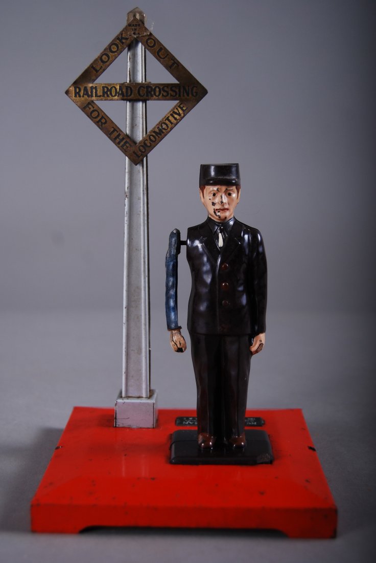 Antique Toy, No. 1045 Flagman for a Lionel Train S: Antique Toy, No. 1045 Flagman for a Lionel Train Set [Height/Length (in)= 7, Width (in)=4, Depth (in)=4, Weight (lbs)=0.25] With Pangaea Auctions C.O.A.