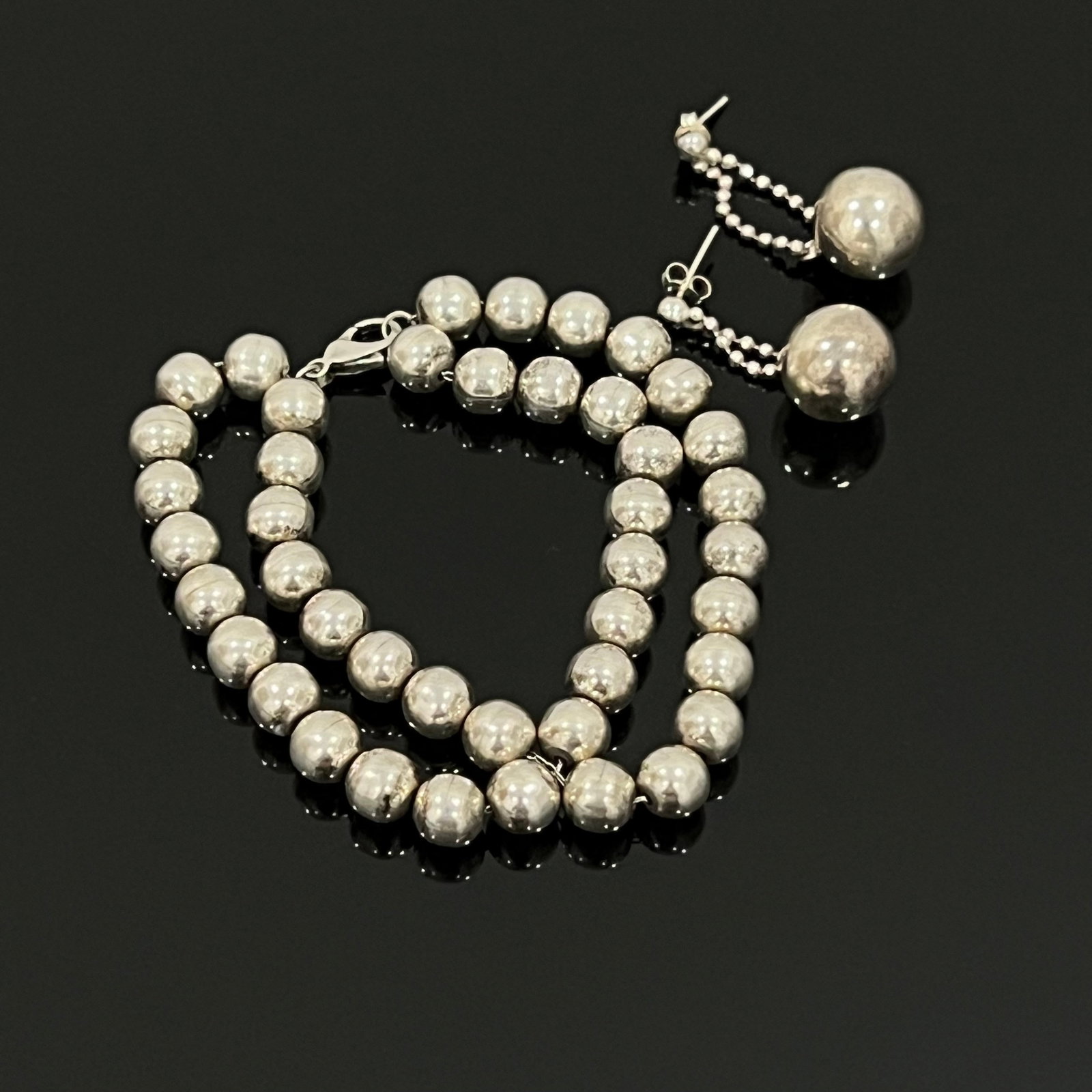 Jewelry Set- Bracelet, Earrings: Jewelry Set- Bracelet, Earrings, Sterling Silver Tested (Unmarked), 53 gram Length 4 inch. Estimated between 50 and 100 years old.All photos represent the lot condition and may contain unseen imperfec