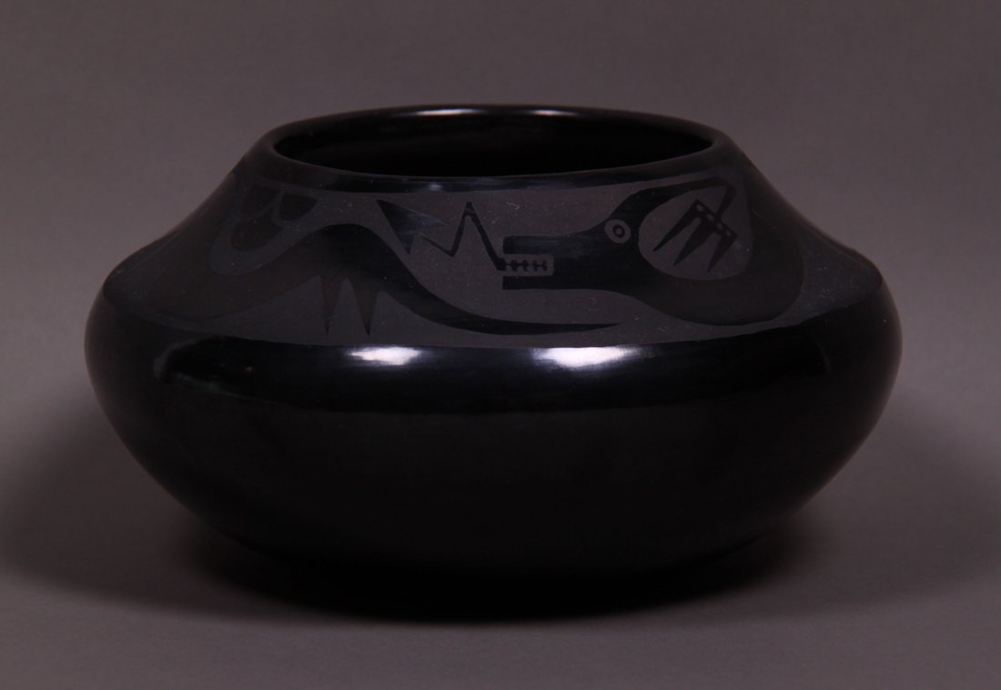 Marie Martinez & Santana (1886-1980) Matte Black on: Marie Martinez & Santana (1886-1980) Matte Black on Black Pottery Olla, San Ildefonso Pueblo, New Mexico. The sides with black on black geometric decoration, signed "Marie & Santana". Polished blackwa