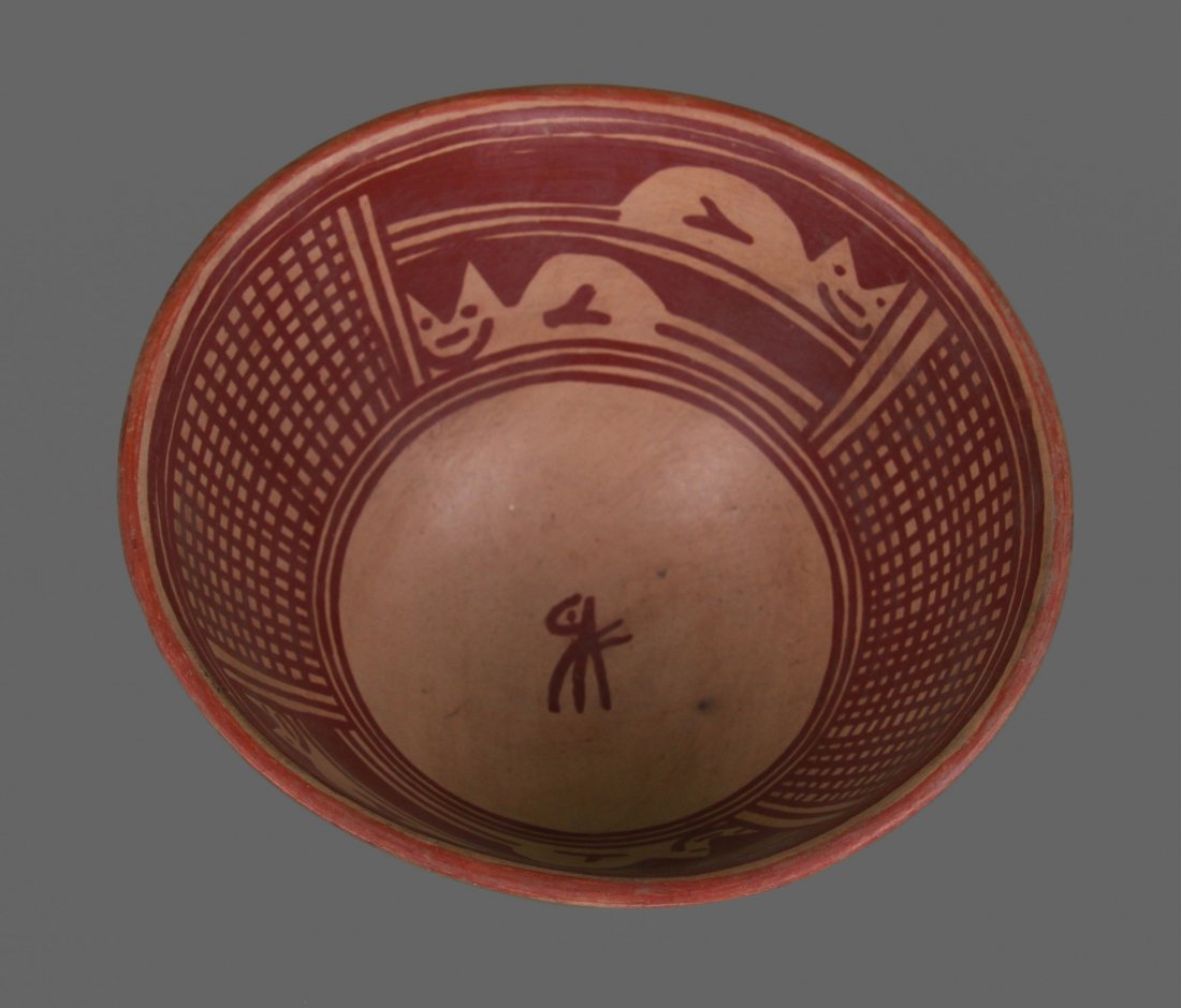 Old pottery (unknown origin), hand painted red on red: Old pottery (unknown origin), hand painted red on red design inside.