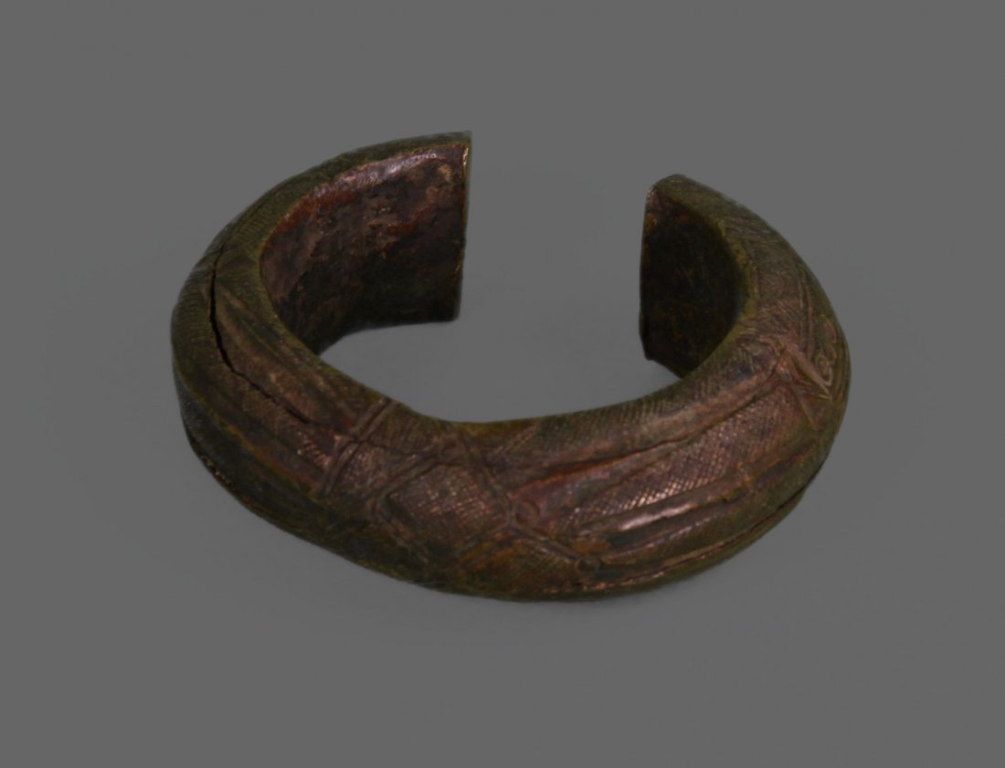 Copper Slave Trade Currency Artifact Bracelet. From: Copper Slave Trade Currency Artifact Bracelet. From West Africa, circa 1800's. Solid bronze "Manila" or slave bracelet. Bracelets of this size and weight were high denomination slave barter artifacts 