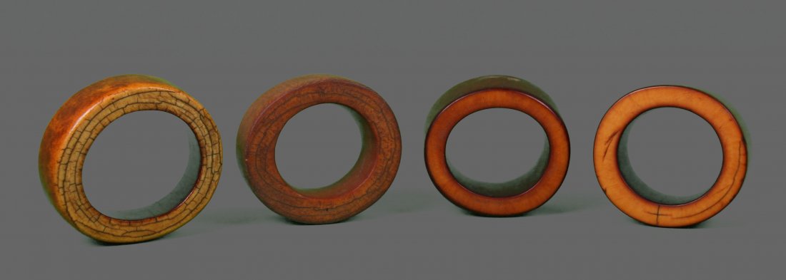 Four (4) Large African Ivory Bangle Bracelet Very: Four (4) Large African Ivory Bangle Bracelet Very heavy, antique ivory bangle bracelet with dark fine patina and crazing.