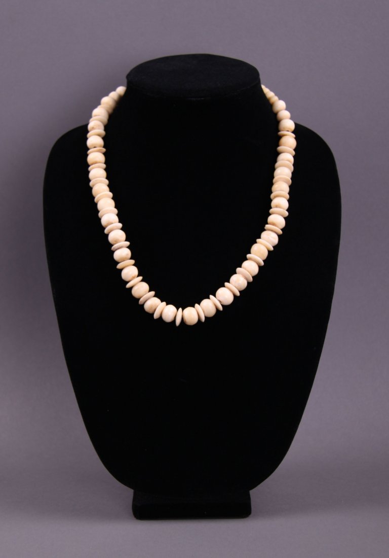 Antique bone carved necklace. Native American or: Antique bone carved necklace. Native American or Pre-Columbian. Origin unknown. Condition Report: The original string no longer exists so it is mounted on a wire for display. (Size: See last photo for