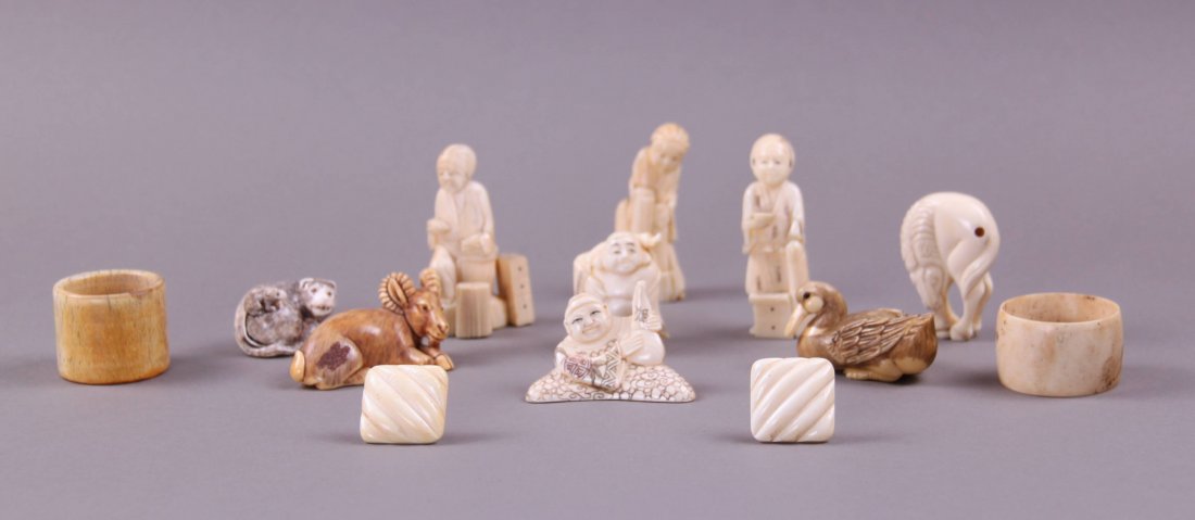 Collection of 9 Ivory Netsuke's, ivory earrings, and 2: Collection of 9 Ivory Netsuke's, ivory earrings, and 2 ivory napkin holders.(Size: See last photo for measurement.) Photos are part of the description representing the condition report. Pangaea Auctio