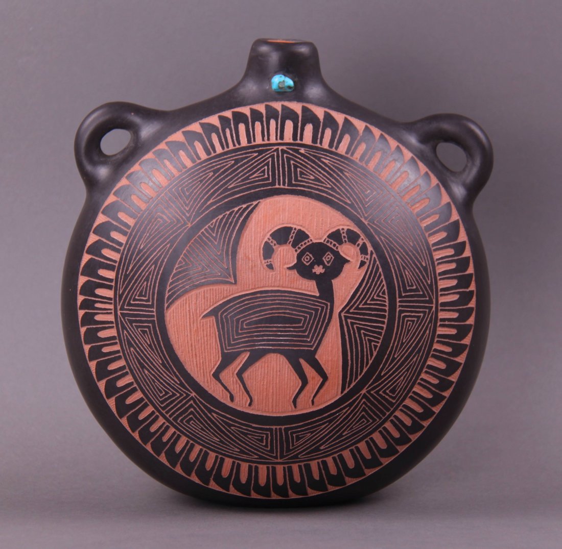 New Mexico Acoma canteen pottery with engraving and: New Mexico Acoma canteen pottery with engraving and turquoise stone, signed "M.S. Acoma N.M."(Size: See last photo for measurement.) Photos are part of the description representing the condition repor