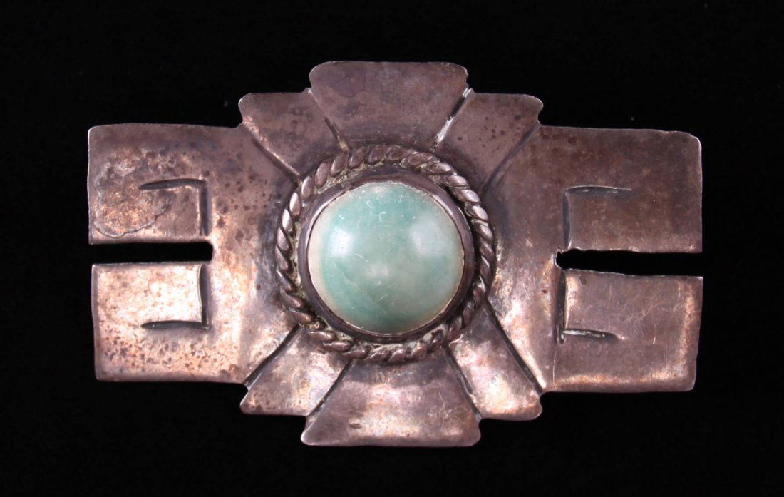 Antique Native American sterling silver pendant with: Antique Native American sterling silver pendant with green center stone.(Size: See last photo for measurement.) Photos are part of the description representing the condition report. Pangaea Auctions u