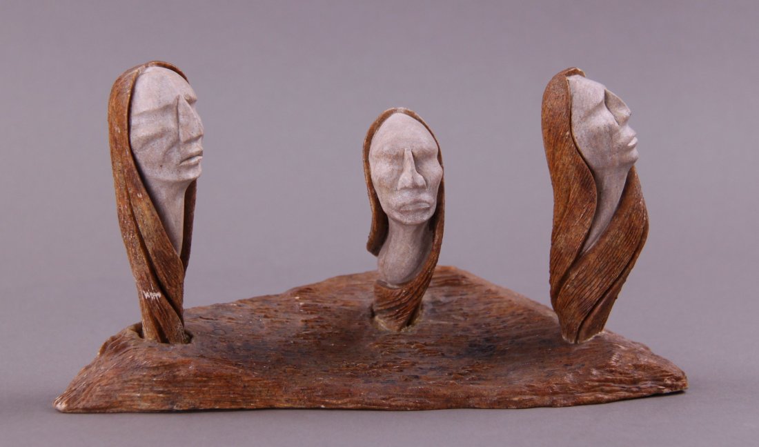 Shawn Thomas stone carving of three heads. Iroquois: Shawn Thomas stone carving of three heads. Iroquois Tribe, Ohsweken Ontario Canada.(Size: See last photo for measurement.) Photos are part of the description representing the condition report. Pangaea