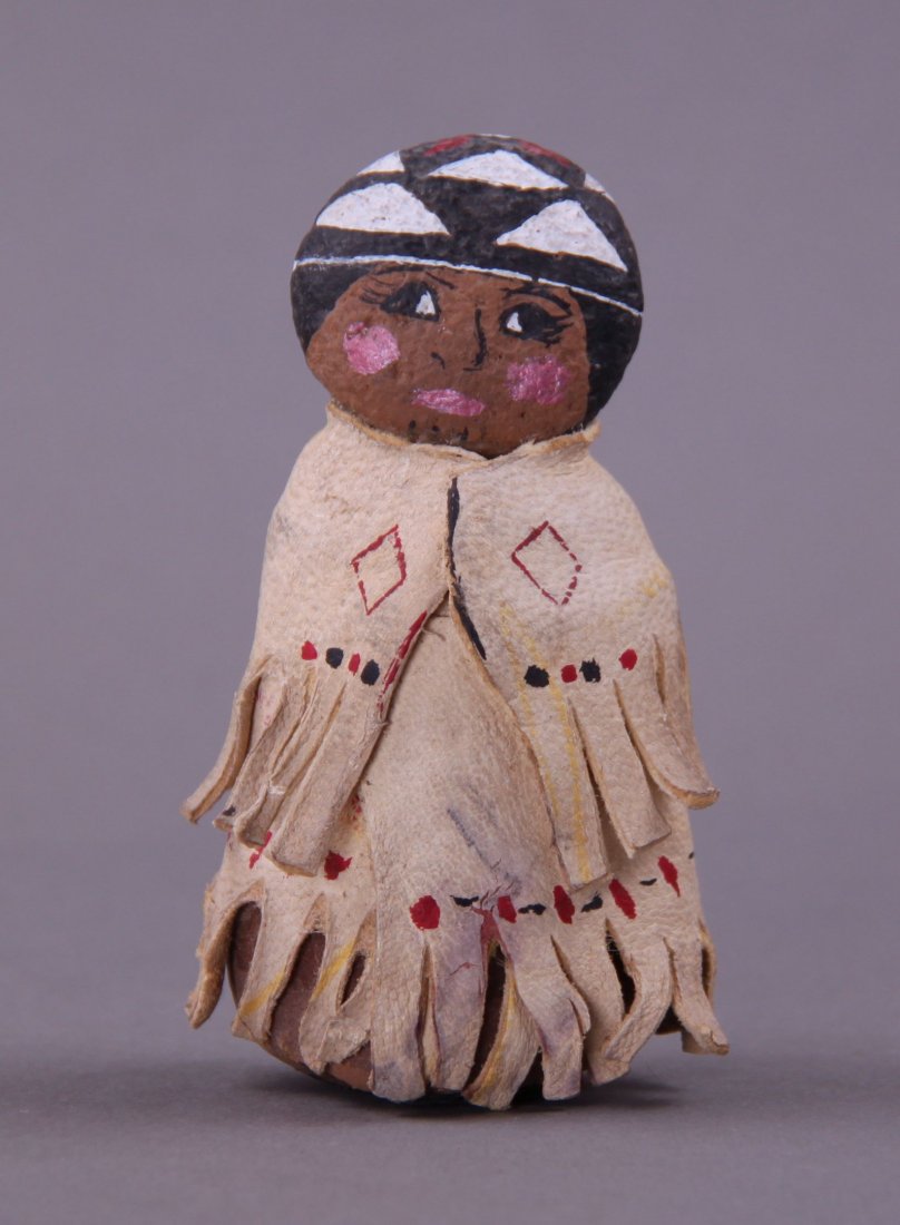Early 1900's Native American hand painted fiber and: Early 1900's Native American hand painted fiber and leather doll.(Size: See last photo for measurement.) Photos are part of the description representing the condition report. Pangaea Auctions urges Bi