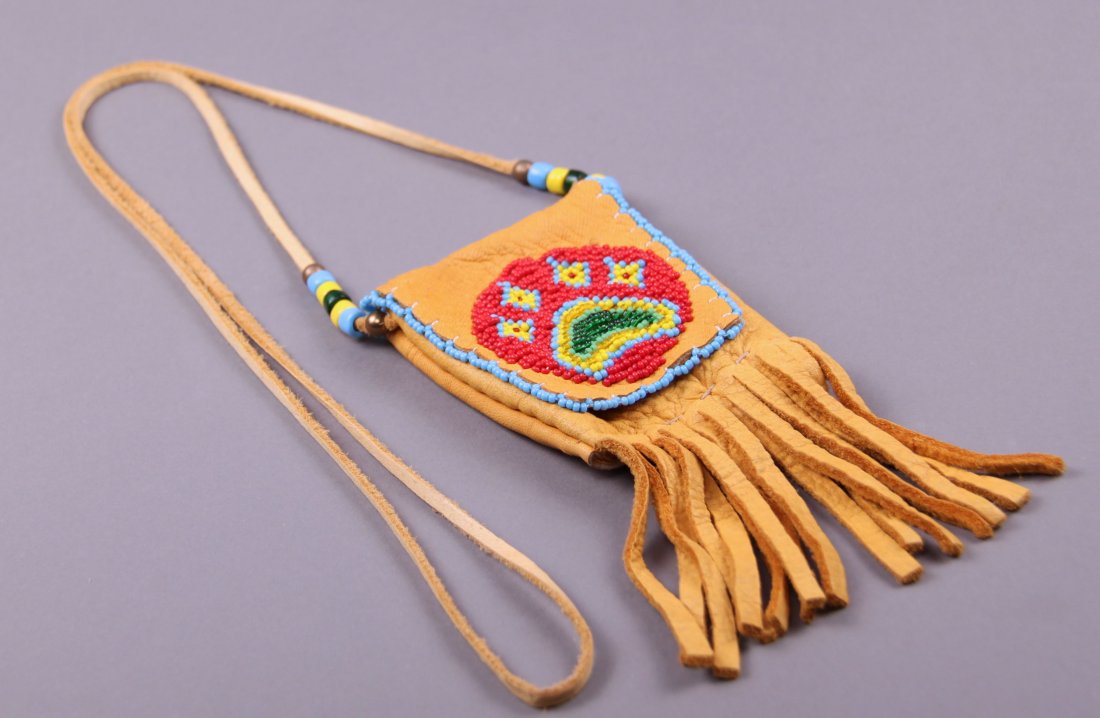 Mid 1900's Native American hand beaded purse with: Mid 1900's Native American hand beaded purse with leather. Certificate of Authenticity, Private Collection of Chief Joe Dan Osceola of the Seminole Tribe. (Size: See last photo for measurement.) Photo