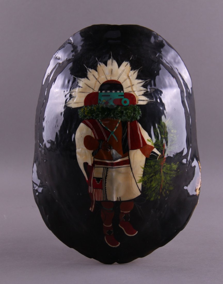 Native American hand painted turtle shell of Kachina.: Native American hand painted turtle shell of Kachina. (Size: See last photo for measurement.) Photos are part of the description representing the condition report. Pangaea Auctions urges Bidder's to v