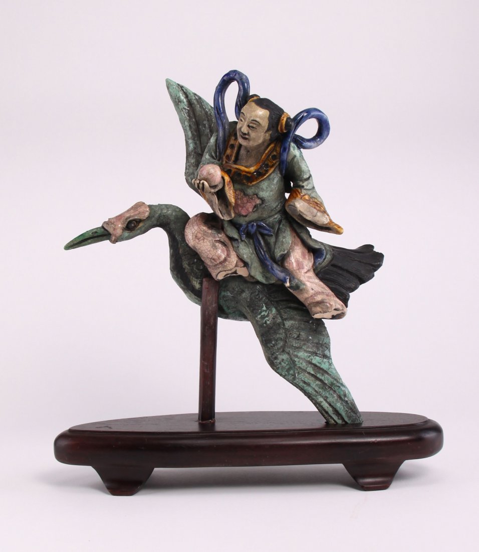 Chinese Roof Tile, Circa 18th Century (or earlier,: Chinese Roof Tile, Circa 18th Century (or earlier, possibly Ming Dynasty.) This ceramic roof tile depicts a guardian figure riding an bird. Chinese roof tiles were exposed to the natural elements and 