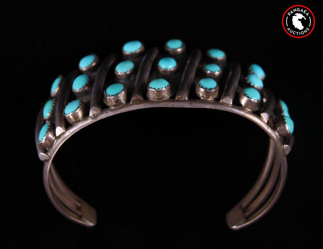 Antique Native American sterling silver bracelet with: Antique Native American sterling silver bracelet with sleeping beauty turquoise. SIZE: see attached ruler photo. Photos are part of the description representing the condition report and can be used fo