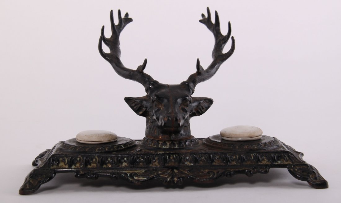 Bradley & Hubbard, double inkwell stand with figural: Bradley & Hubbard, double inkwell stand with figural elk head and antlers that serve as a multi-tier pen holing rack, signed "B&H 6013". With porcelain lid inkwells. SIZE: see attached ruler photo. Ph