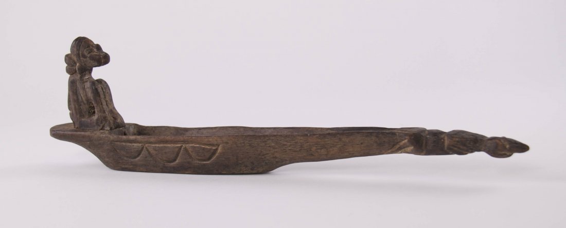 African wood Incense burner depicting a man on a canoe. (1 of 6)