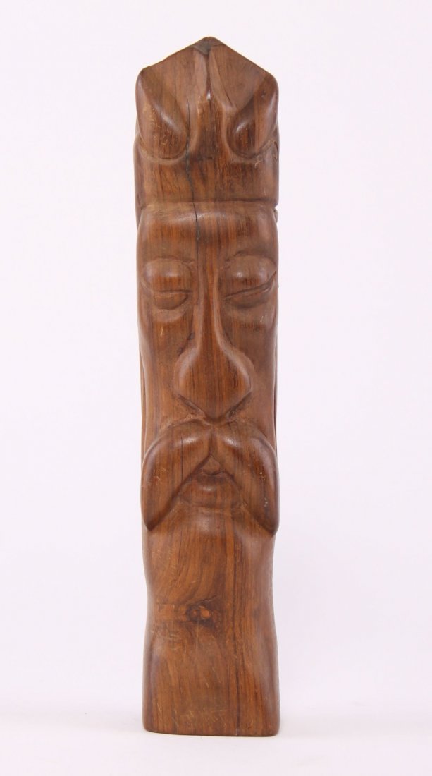 Architectural wood carving of a man with a mustache. (1 of 5)