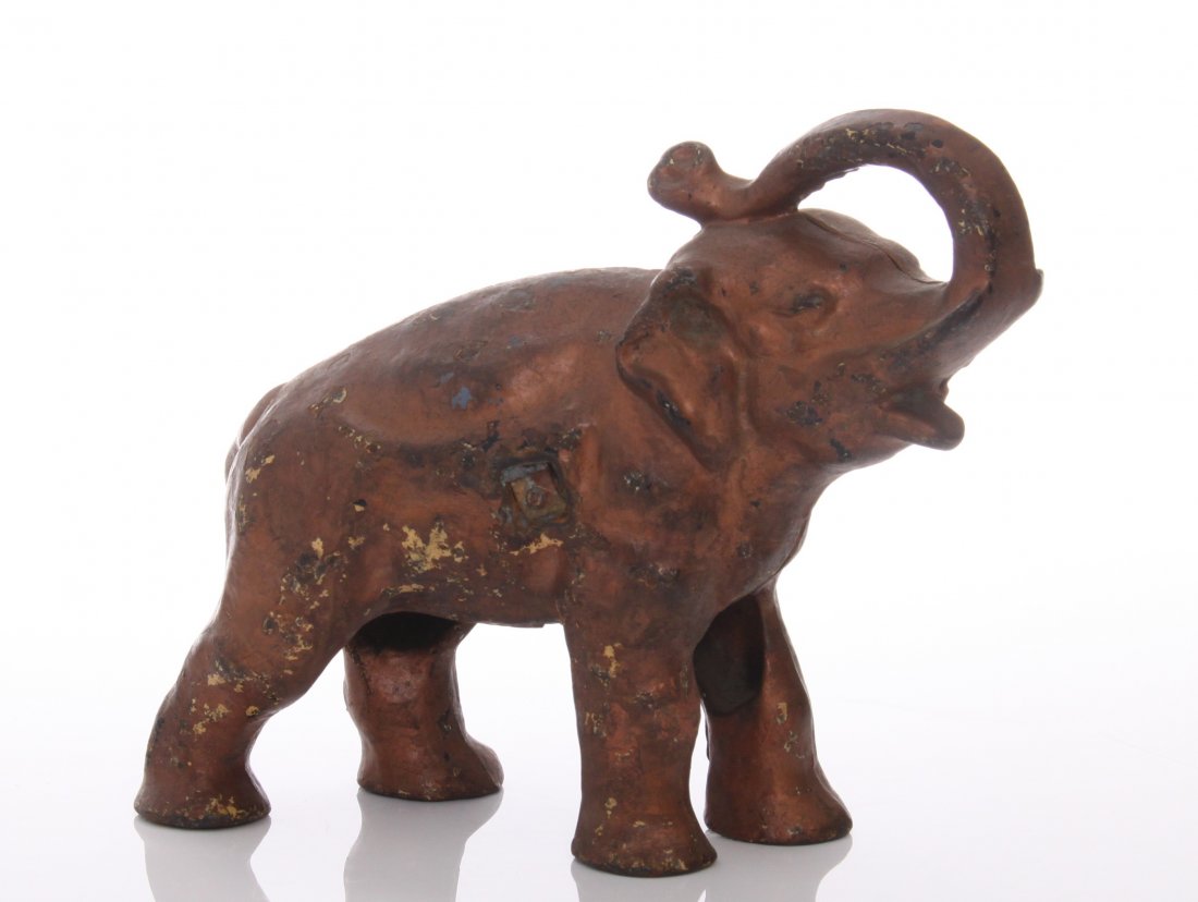 Antique cast iron Elephant doorstop. SIZE: see attache: Antique cast iron Elephant doorstop. SIZE: see attached ruler photo. Photos are part of the description representing the condition report and can be used for authentication prior to the sale date. Pan