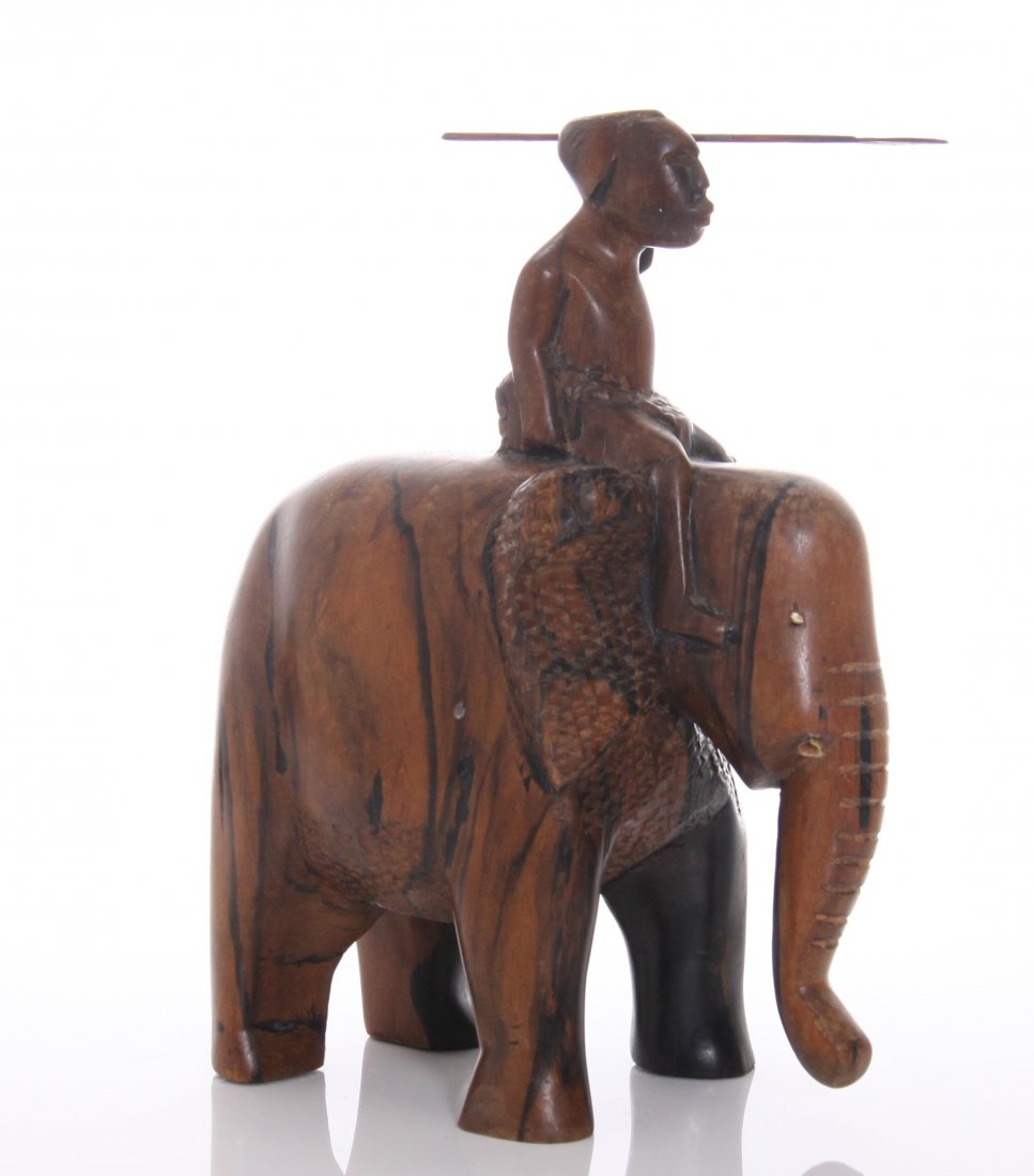 Antique African wood carving of a hunger riding an elep: Antique African wood carving of a hunger riding an elephant. SIZE: see attached ruler photo. Photos are part of the description representing the condition report and can be used for authentication pri