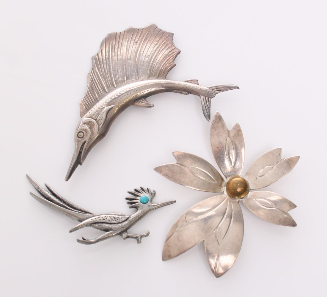 Three(3) sterling silver pendants of a Marlin, Road Run: Three(3) sterling silver pendants of a Marlin, Road Runner and Flower. The Road Runner is made by famous Native American Markings: J. Ritter SIZE: see attached ruler photo. Photos are part of the desc