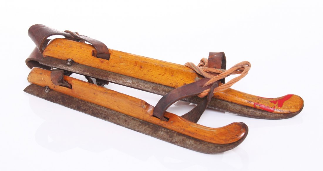 Antique wood and iron ice skates. SIZE: see attached r: Antique wood and iron ice skates. SIZE: see attached ruler photo. Photos are part of the description representing the condition report and can be used for authentication prior to the sale date. Pangae