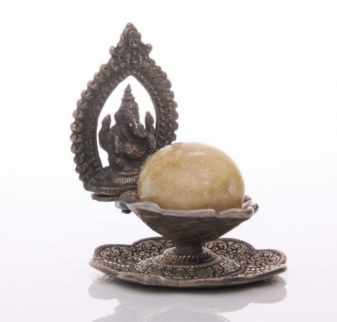 Brass Ganesh dish with stone egg. SIZE: see attached: Brass Ganesh dish with stone egg. SIZE: see attached ruler photo. Photos are part of the description representing the condition report and can be used for authentication prior to the sale date. Pangae