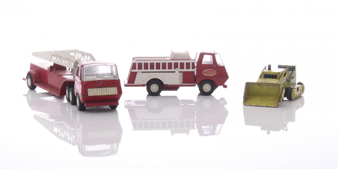 Three(3) vintage Tonka toys. Fire Truck, Fire Engine,: Three(3) vintage Tonka toys. Fire Truck, Fire Engine, and Bull Dozer. SIZE: see attached ruler photo. Photos are part of the description representing the condition report and can be used for authentic
