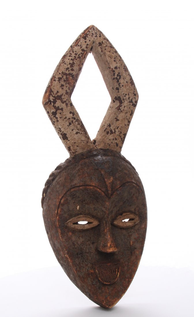Antique African wood mask, Republic of Congo.: Antique African wood mask, Republic of Congo. Estimated more than 50 yrs old. African art is a term typically used for the art of Sub-Saharan Africa. A few of the most popular traditional African art 