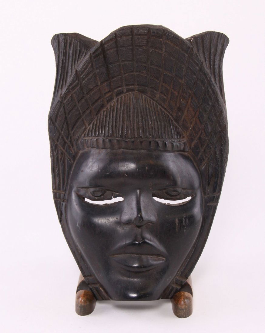 African mask carved from ebony wood. Estimate: African mask carved from ebony wood. Estimated less than 50 yrs old. African art is a term typically used for the art of Sub-Saharan Africa. A few of the most popular traditional African art was produ