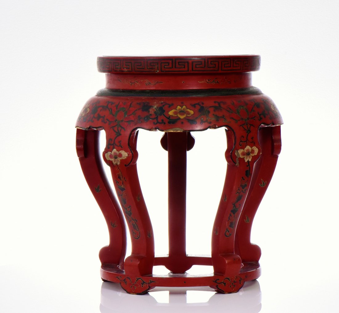 Chinese Lacquered Garden Stool with Cloisonne: Chinese Lacquered Garden Stool with Cloisonne Enamel Insets incised and painted with colorful stylized scrolling flowers and vines against a red lacquer ground. Condition Report: Small Old Repair On L
