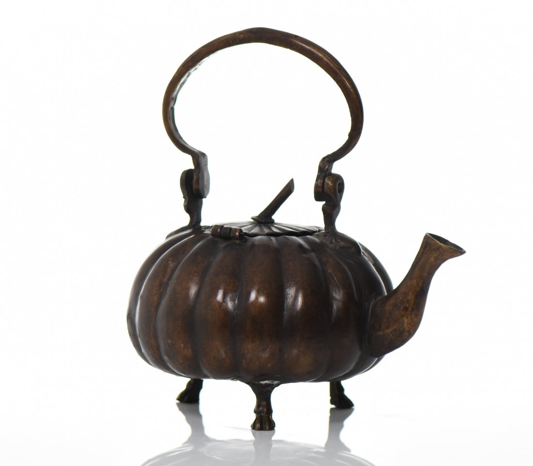 Chinese Bronze Tea Pot With Hinged Lid.. Est: Chinese Bronze Tea Pot With Hinged Lid.. Estimated more than 100 yrs old. Chinese art is visual art that, whether ancient or modern. Early "stone age art" dates back to 10,000 BC, mostly consisting of