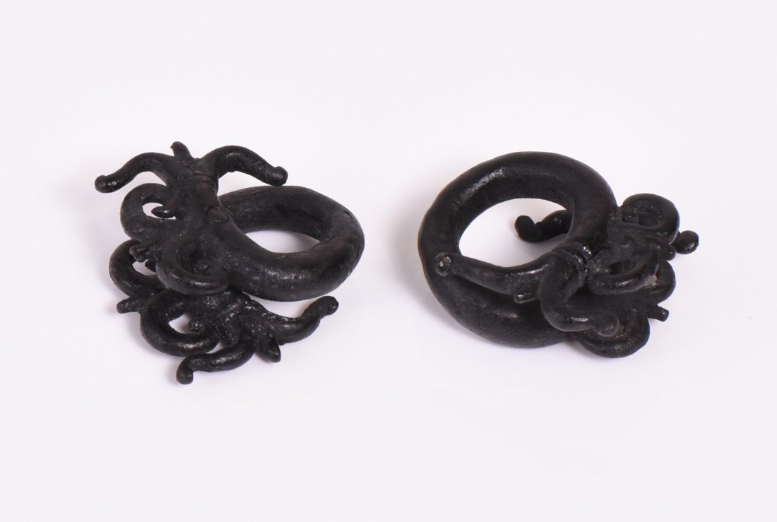 Antique Dayak Wrought Iron Spiral Ear Lobe Plu: Antique Dayak Wrought Iron Spiral Ear Lobe Plugs Depicting The Mythical Aso Dragon, Borneo Island. The Dayak or Dyak are the native people of Borneo. It is a loose term for over 200 riverine and hill