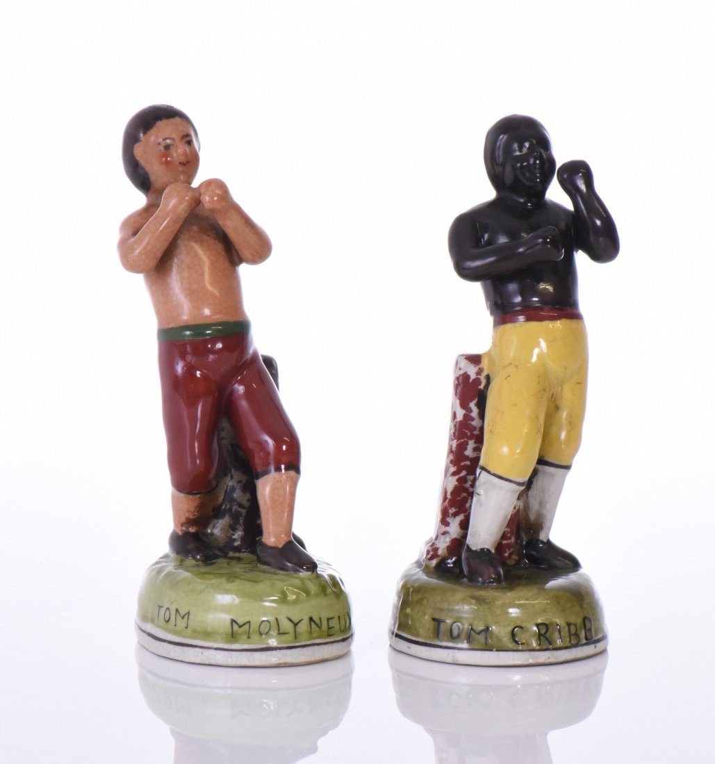 Pair of Staffordshire Boxing Figures Tom Cribb: Pair of Staffordshire Boxing Figures Tom Cribb and Tom Molyneux. Professional boxers of the early 19th Century. They boxed each other in 1810. Estimated more than 50 yrs old. (Pangaea Auctions) Size: