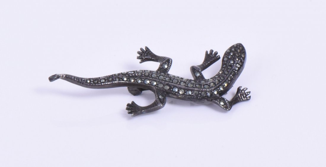 Vintage Lizard Marcasite Sterling Silver Brooc: Vintage Lizard Marcasite Sterling Silver Brooch. Base Stand Not Included. Estimated more than 50 yrs old. 925 Sterling Silver consisting of 92.5% silver and 7.5% copper. Tested Positive using Nitric A