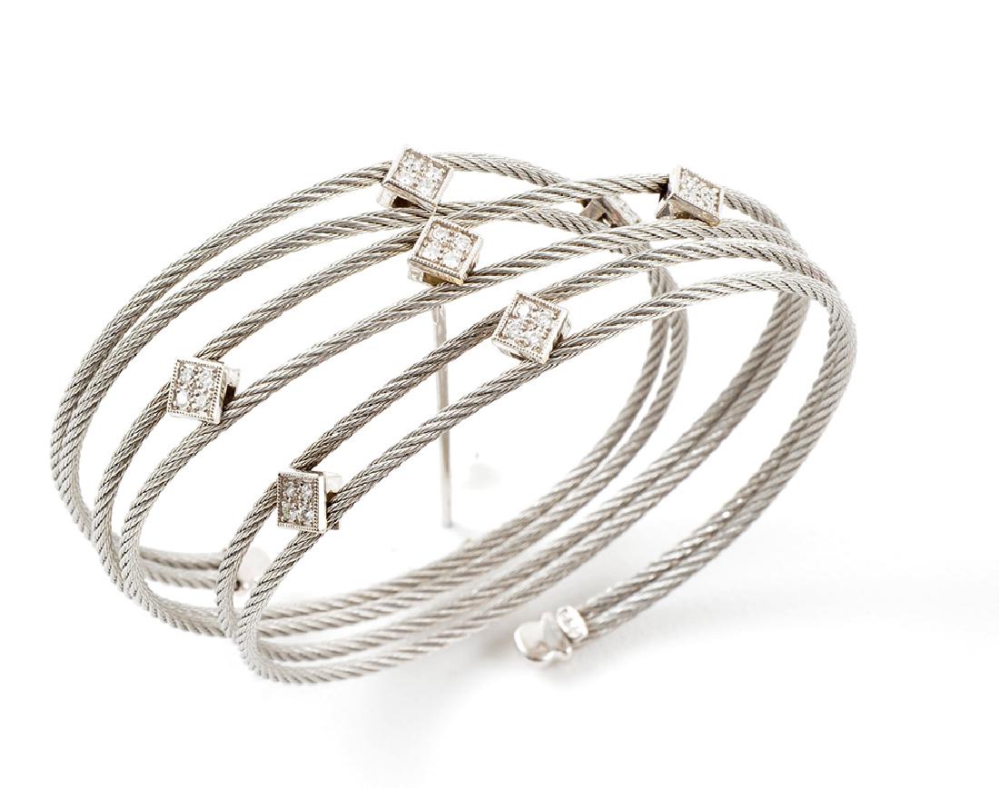 CHARRIOL – 14K GOLD: 14K white gold bracelet set with zircons, signed « C ». Weight: 16.17g.