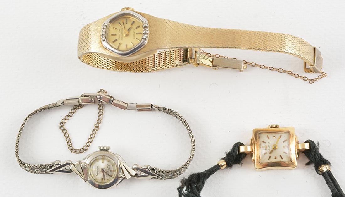 LONGINES, BULAVO AND GENEVE - 14K GOLD: Lot of two 14K white and yellow gold watches signed "Longines" and "Geneve". Also comprising a watch signed "Bulova". Total weight: 46.0g.