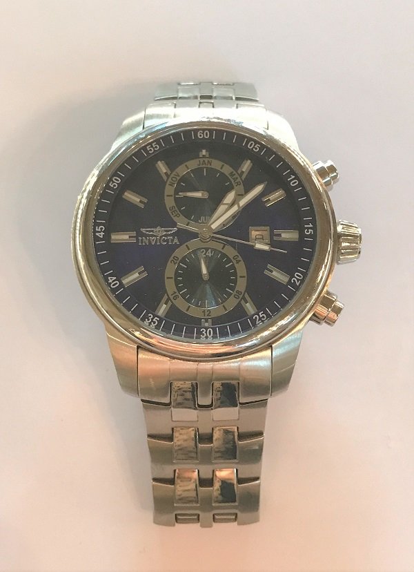 INVICTA - STAINLESS STEEL: Men's sport chronograph watch, blue night dial, stick index, date window at 3 o'clock, flexible and folding clasp with the logo.Signed "Invicta" on the dial.Weight: 164.6g