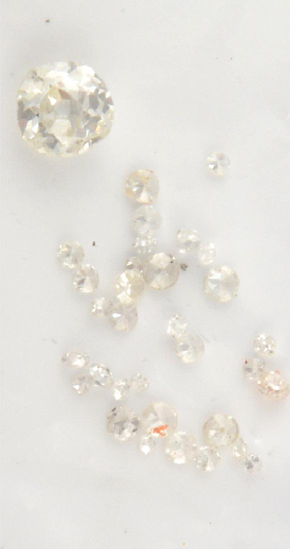 DIAMONDS - APPROXIMATIVE TOTAL WEIGHT OF 0.78 (1 of 1)