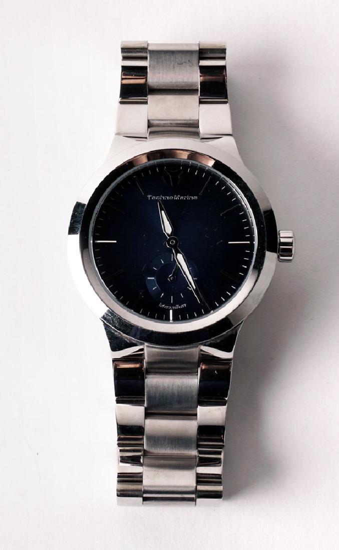 TECHNOMARINE - MOONSUN: Man's watch signed Technomarine, Moonsun model, blue dial, silvery needles and applied index, seconds window at 6 o'clock, steel bracelet with folding clasp. Diam.: 45mm