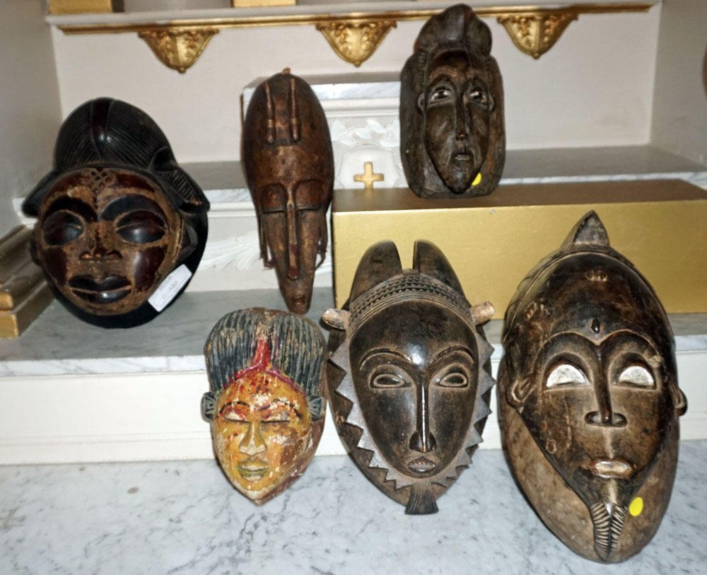 AFRICAN ART - MASKS: Series of 5 african wooden masks. H.: 40cm - 16" (the biggest) Also included a mask probably indonesian.