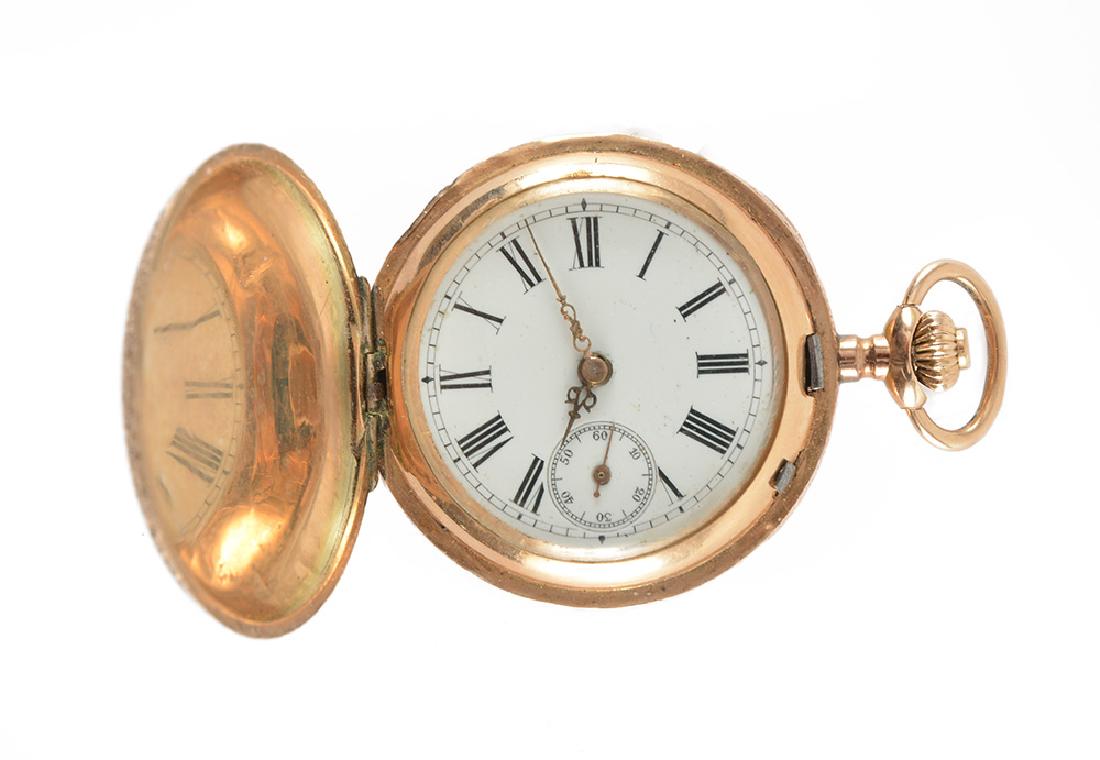 14K GOLD: 14K yellow gold pocket watch, finely chiseled gold case decorated with coat of arms, white enamel dial with seconds window at 6 o'clock, Roman numerals and applied index, openwork needles, manual wind