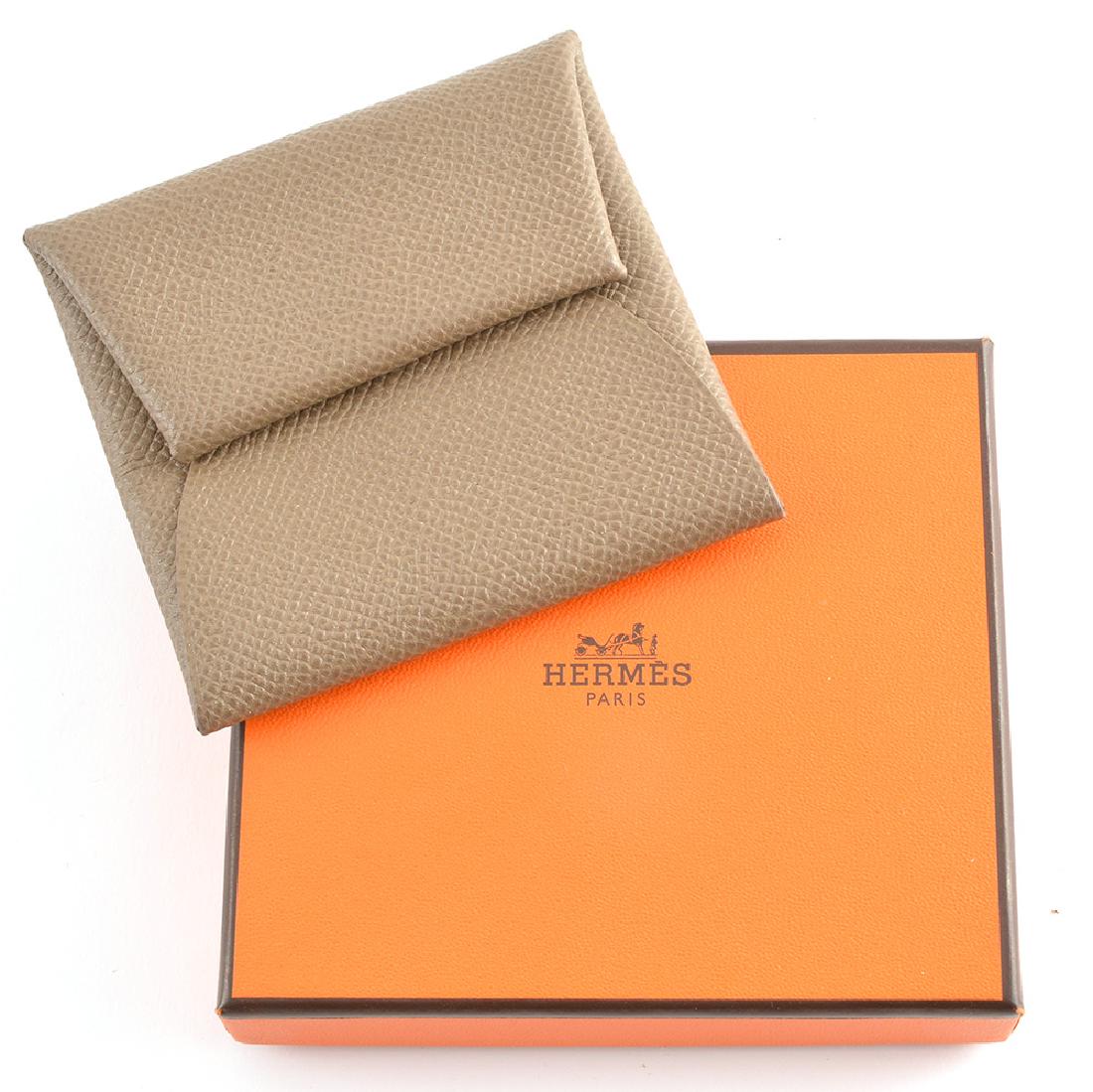 HERMÈS PARIS - BASTIA: LOUIS VUITTON Brown leather wallet by Louis Vuitton, Bastia model. With its original box.