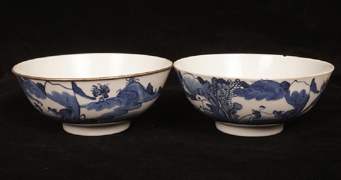 Vietnamese pottery, 19th century: Set of 2 white ceramic bowls decorated with hand painted patterns. Vietnam, 19th century. H : 5cm - 2.5’’ D : 15cm - 6’’