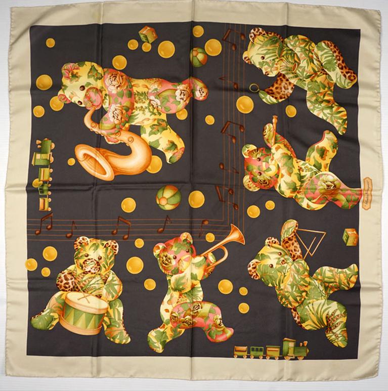 SALVATORE FERRAGAMO: LOT OF 6 SALVATORE FERRAGAMO SILK SCARVESSilk scarves from the Salvatore Ferragamo brand including:1 on the theme of forest fruits;1 on the theme of cubs & musical notes;1 on the theme tiger & monkey;