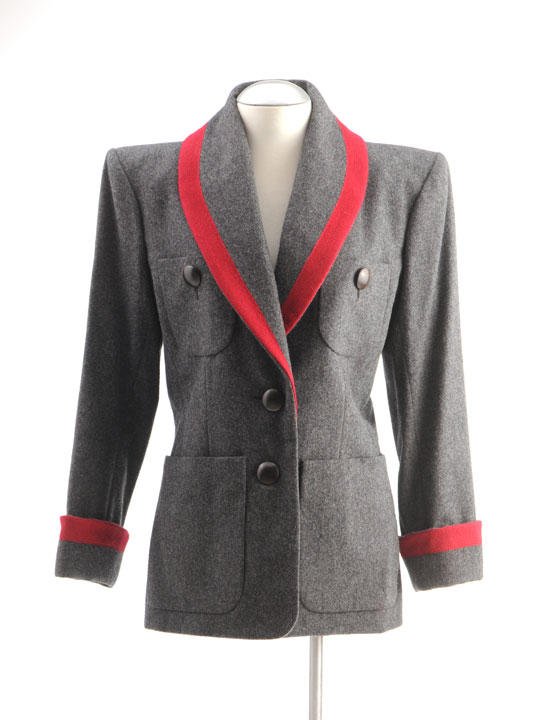 YVES SAINT LAURENT - RIVE GAUCHE: Grey wool vest decorated with a red edge, shawl collar, single breasted, 4 stitched patch pockets, 2 with buttons, Size 40.