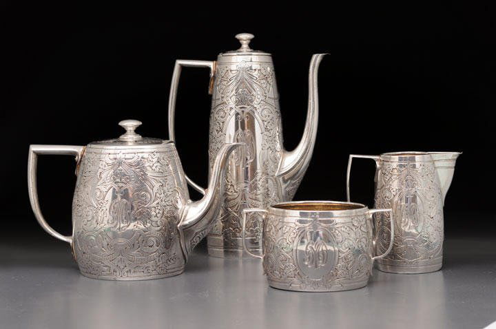 STERLING SILVER: STERLING SILVER Tea and Coffee Set including 1 coffee pot, 1 teapot, 1 milk jug and 1 sugar bowl. U.S.A., The Gorham Co. Hallmark on the bottoms. Weight of the 4 pieces: 1580 grams (approx.) Height of