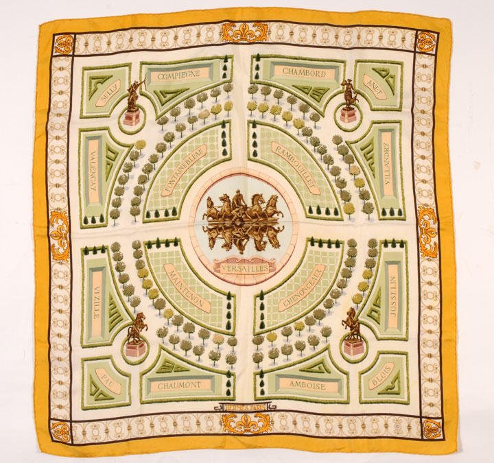 HERMÈS 100% printed silk, titled "Versailles" and: HERMÈS 100% printed silk, titled "Versailles" and signed "Vauzelles".