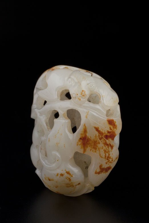 RETICULATED JADE PENDANT - Private Canadian Collector: A FINE AND ANTIQUE CARVED AND RETICULATED BAT AND GOURD JADE PENDANT CHINA Masterfully hollowed and reticulated in a stone of ovate shape, reticulated design of a bat flying amidst tendrils and leaves