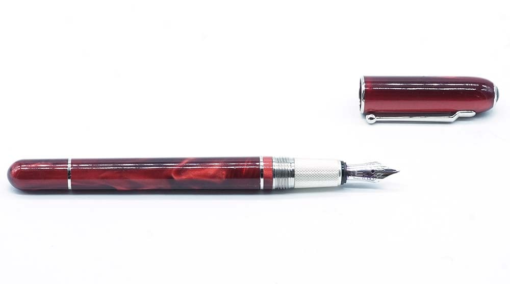 DUNHILL "SIDECAR": Description française: DUNHILL "SIDECAR" Stylo à plume Dunhill "Sidecare", couleur rouge. Plume or 18k, à cartouches. Sans boîte. English Description: DUNHILL