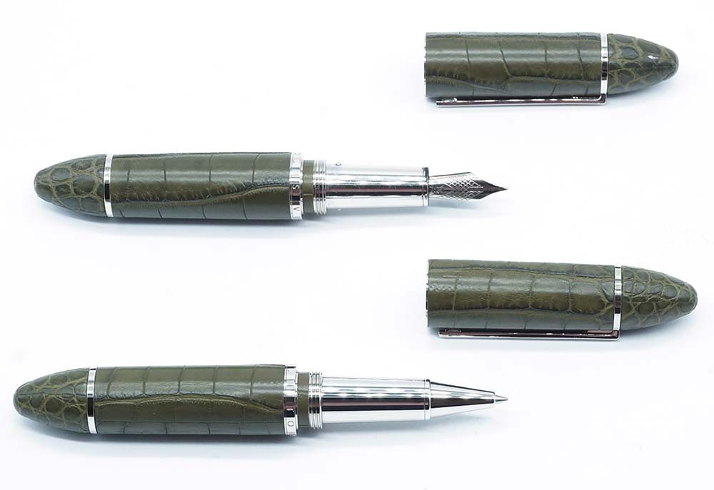 LOUIS VUITTON "CARGO": Description française: LOUIS VUITTON "CARGO" Ensemble d'un stylo à plume et d'un stylo à bille Louis Vuitton "Cargo", motif alligator, cuir vert olive. Plume or 18k, à