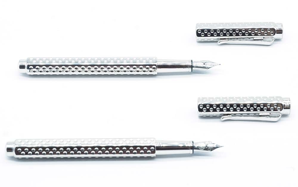 CARAN D'ACHE "ECRIDOR GOLF": Description française: CARAN D'ACHE "ECRIDOR GOLF" Deux stylos à plume Caran d'Ache "Ecridor Golf". Plume tailles F et M, à cartouches. Sans boîte. English Description: CARAN D'ACH