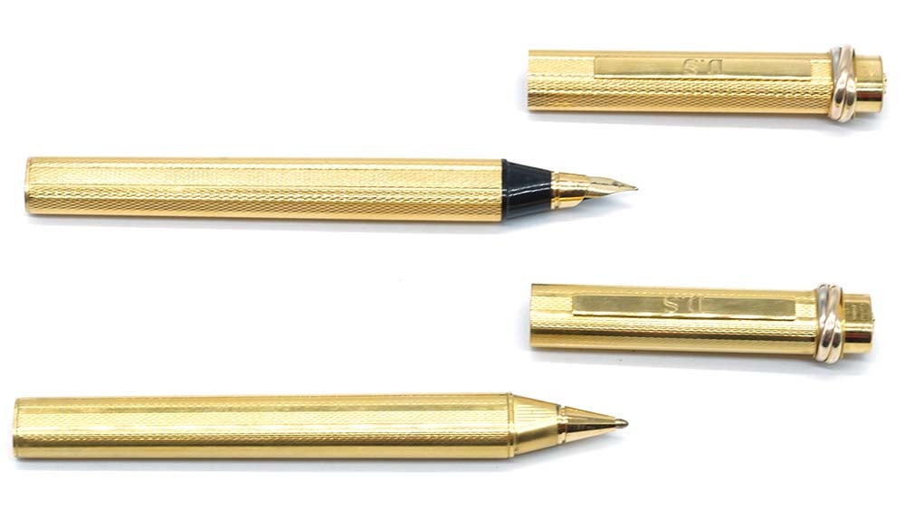 CARTIER "TRINITY": Description française: CARTIER "TRINITY" Ensemble d'un stylo à bille et d'un stylo à plume plaqués or Cartier "Trinity", trois anneaux entrelacés sur le capuchon. Numérot